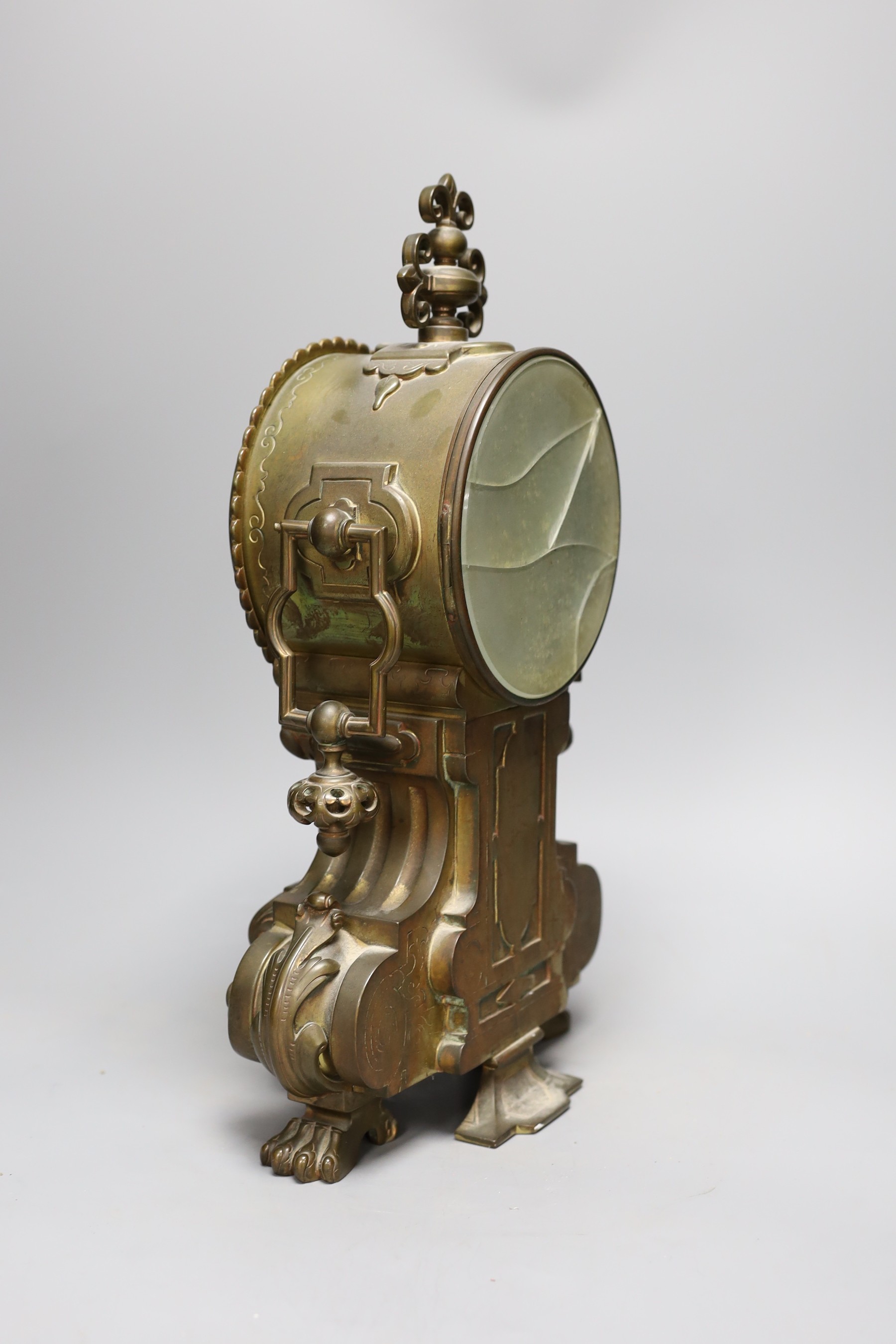 A late 19th century French brass cased mantel clock, 41 cms high